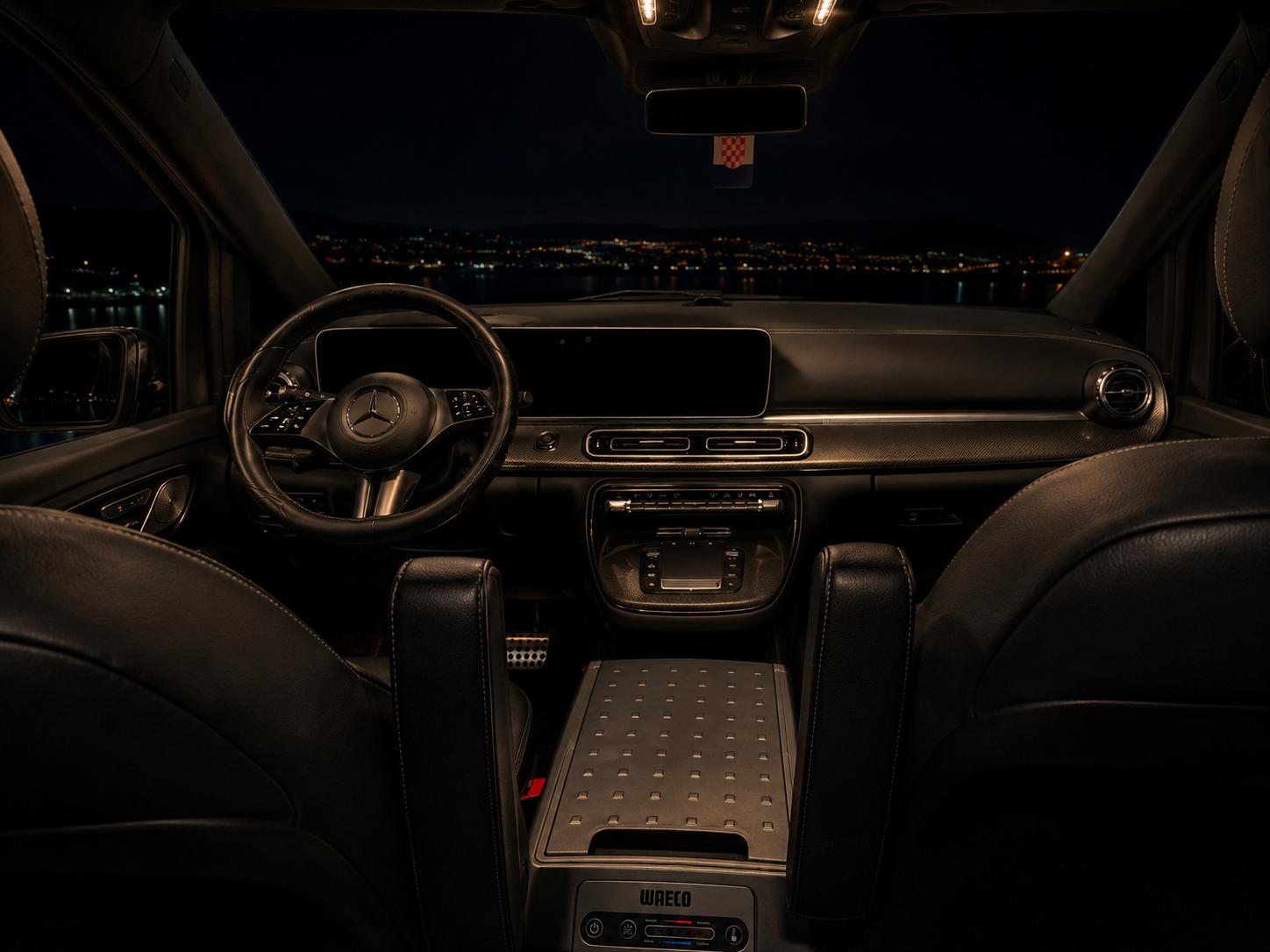 Mercedes-Benz V-Class front cabin and dashboard overlooking the Split coastline at night