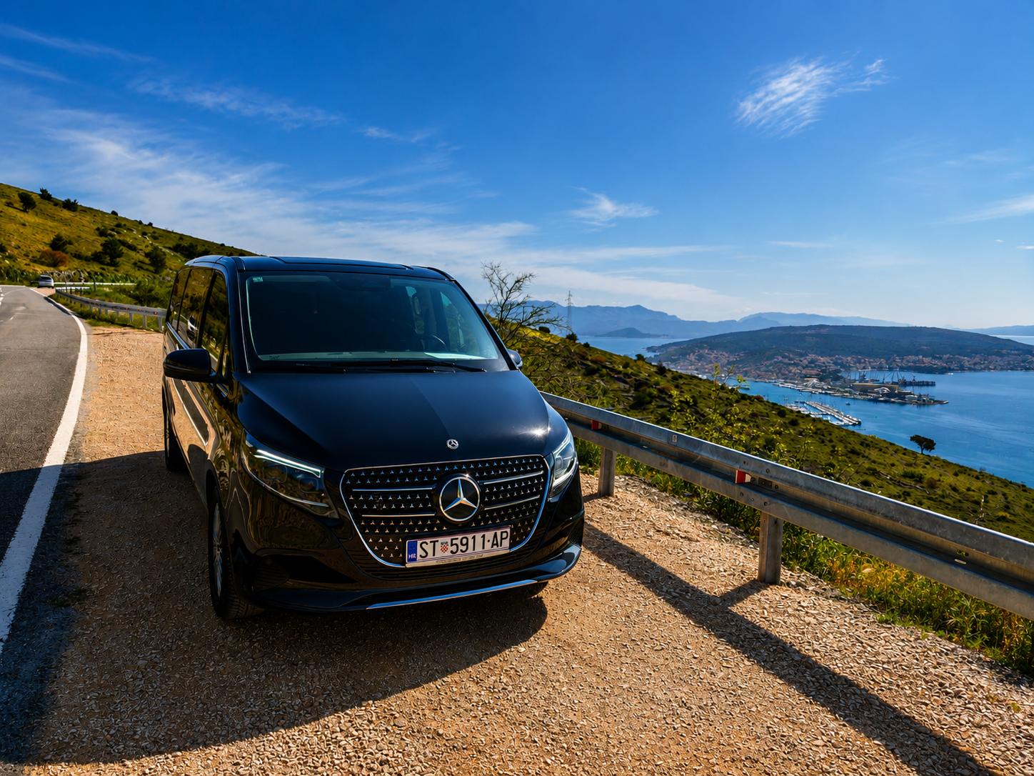 Private Mercedes-Benz excursion vehicle on a Dalmatian coastal road with island views